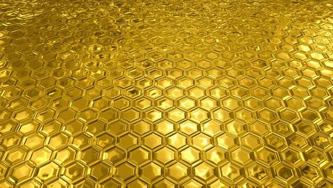 Reflective Gold Hexagonal Honeycomb Texture with Beveled Edges and Gleaming Sheen