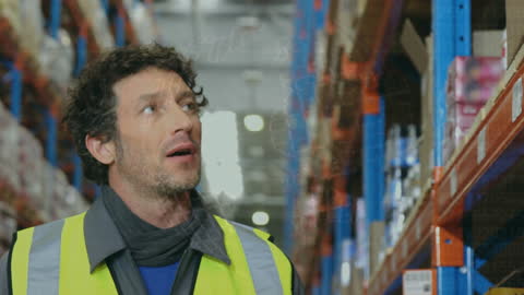 Warehouse Worker Analyzing Digital Data