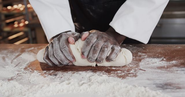 Baker Kneading Dough on Wooden Table in Rustic Bakery - Download Free Stock Images Pikwizard.com