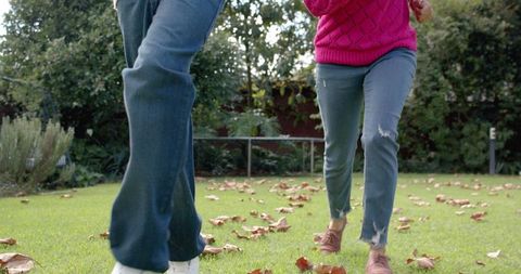 Mother and Son Enjoying Football in Autumn Garden - Download Free Stock Images Pikwizard.com