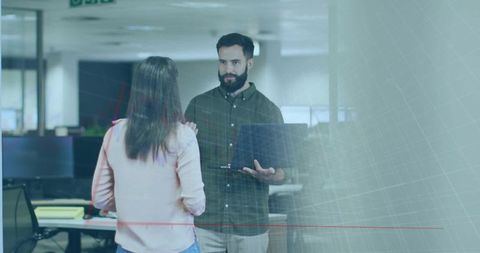 Coworkers Collaborating in Modern Office Setting with a Digital Overlay Concept