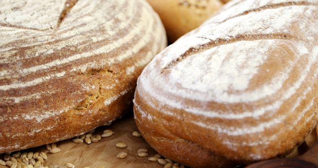 Freshly Baked Rustic Breads on Wooden Surface - Download Free Stock Images Pikwizard.com