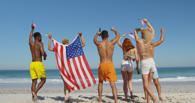 Friends Celebrating Independence Day on Beach with American Flag - Download Free Stock Images Pikwizard.com