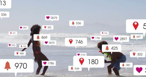 Children playing and splashing at beach wearing swimsuits and holding water toy with social icons