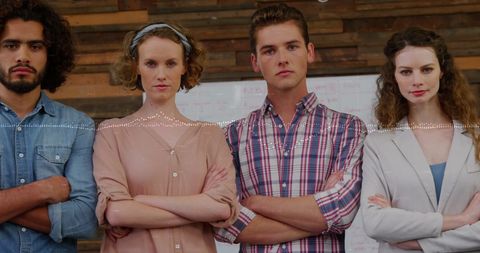 Confident Business Team Analyzing Financial Data in Modern Office