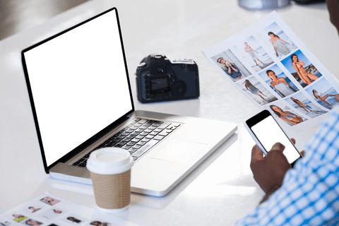 Transparent Workspace with Laptop, Camera, and Smartphone in Use - Download Free Stock Videos Pikwizard.com