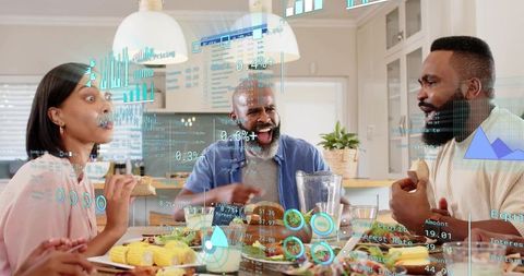 Family laughing and sharing dinner while exploring augmented reality holographic charts