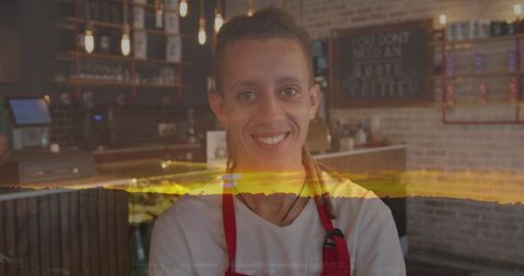 Smiling Coffee Shop Employee Welcoming Customers with Warmth