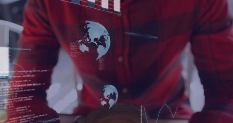 Programmer analyzing holographic data displays at workspace