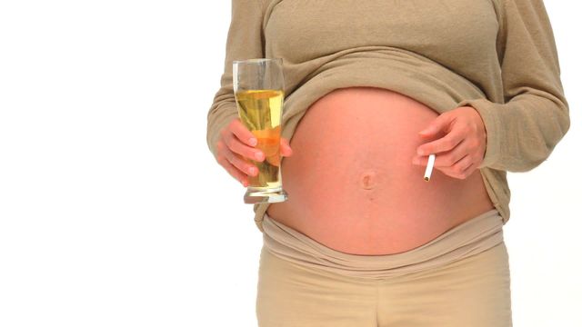 Depicts dangerous lifestyle choices during pregnancy, such as consuming alcohol and smoking cigarettes. Useful for educational materials highlighting the risks and negative impacts on maternal and fetal health. Can be used for campaigns promoting healthy pregnancies or public service announcements.