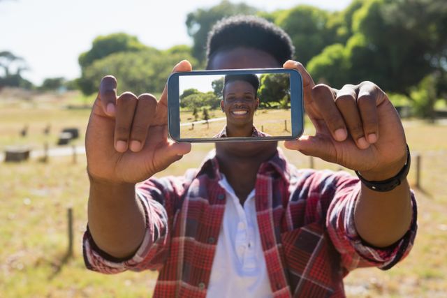 Man taking selfie on mobile phone - Download Free Stock Photos Pikwizard.com