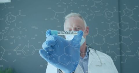 Doctor Holding Vaccine Amidst Digital Chemical Formulas