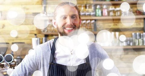 Happy bartender in cozy craft cocktail bar