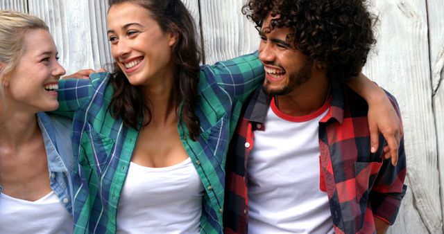 Diverse Group of Friends Laughing Outdoors in Casual Wear - Download Free Stock Images Pikwizard.com