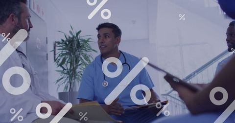 Diverse Medical Team Analyzing Data with Tablets