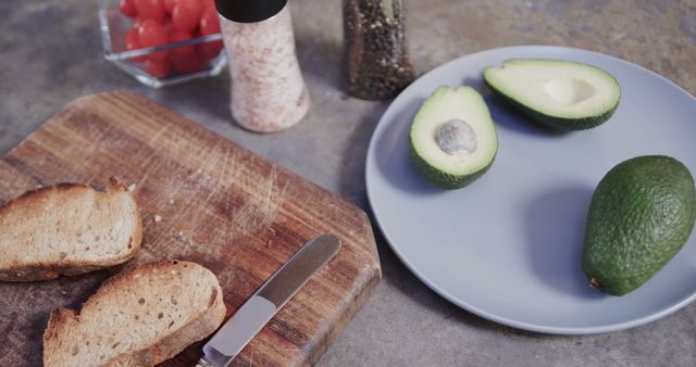 Preparing Avocado Toast with Fresh Ingredients on Kitchen Counter - Download Free Stock Images Pikwizard.com