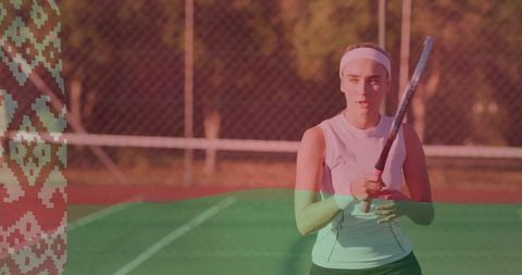 Female Tennis Player Ready to Serve on Sunlit Court