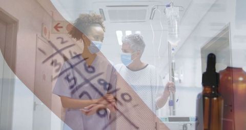 Nurse Assisting Patient with IV in Clean Hospital Corridor