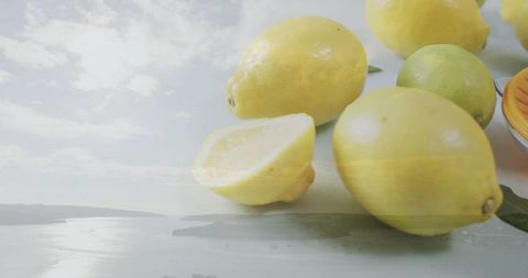 Fresh Lemons and Lime on Tabletop with Copy Space