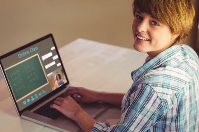 Smiling caucasian girl using laptop for video call, with class on screen. communication technology and online education, digital composite image.