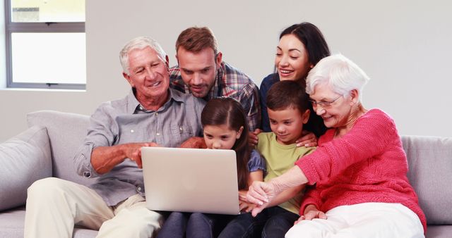 Multi-Generational Family Enjoying Time Together Using Laptop - Download Free Stock Images Pikwizard.com