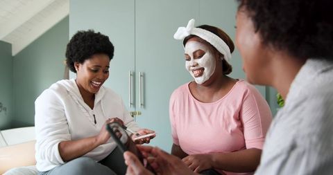 Group of Smiling Women Enjoying Spa Day Together