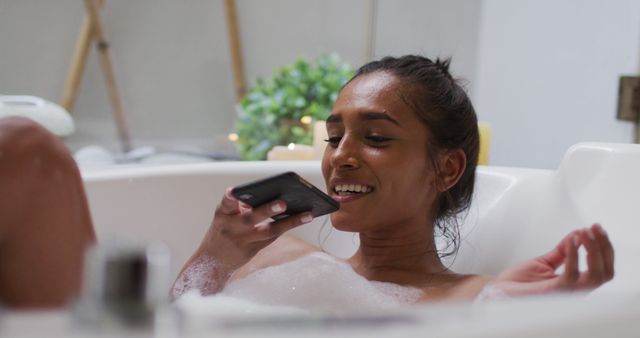 Woman Relaxing in Bathtub Talking on Smartphone at Home - Download Free Stock Images Pikwizard.com