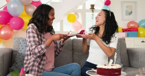 Joyful Friends Celebrating with Cake and Casual Conversations