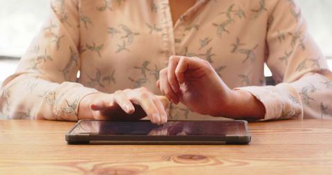 Hands ready on tablet device for business meeting start