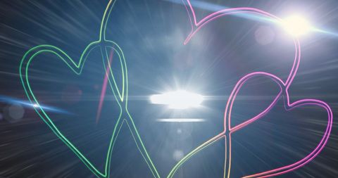Neon Heart Shapes with Bright Light Effect on Dark Background - Download Free Stock Images Pikwizard.com