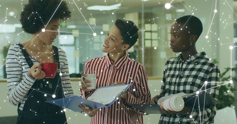 Diverse Team Engaging in Technology Empowered Collaboration