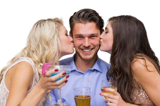 Happy Man Being Kissed By Two Women at Celebratory Party on Transparent Background - Download Free Stock Videos Pikwizard.com