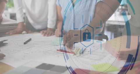 Team Collaboration on Architectural Blueprint with Digital Overlay