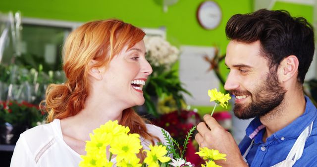 Couple Enjoying Fresh Flowers Together in Flower Shop - Download Free Stock Images Pikwizard.com