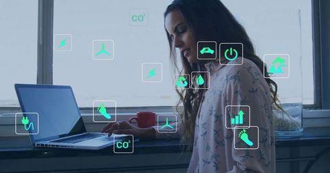 Modern Environmentalist Woman Using Laptop with Floating Energy Icons