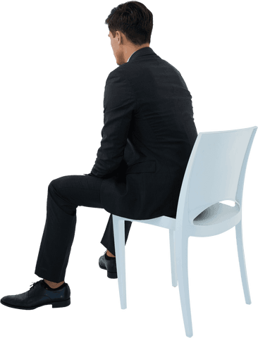 Transparent View of Businessman Sitting on Chair in Office Attire
