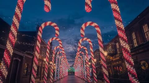 Glide Through Festive Street with Illuminated Candy Cane Arches