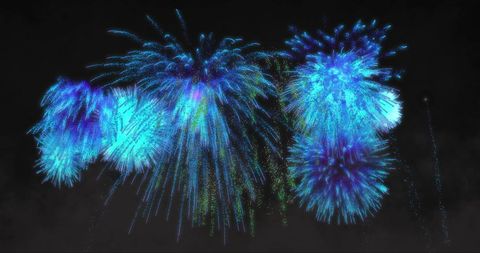 Vibrant Blue Fireworks Exploding on Black Night Sky