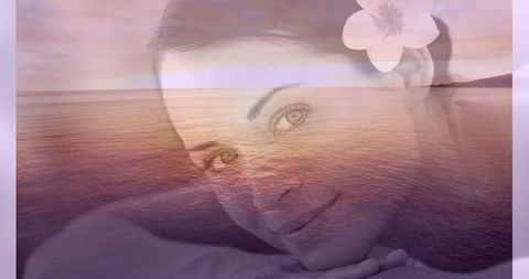 Dreamy Woman With Flower Overlooking Serene Ocean Sunset