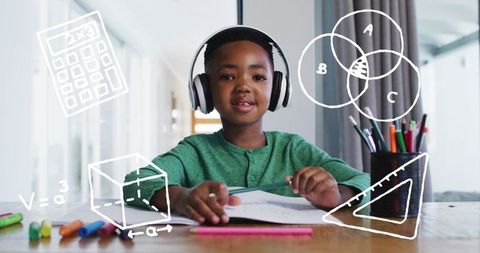Happy African American Child Wearing Headphones Studying from Home
