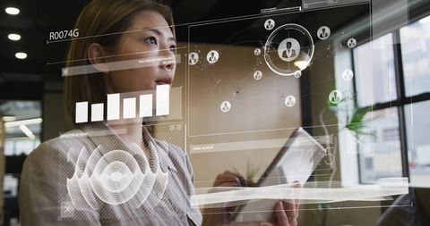 Innovative Businesswoman Analyzing Digital Financial Data