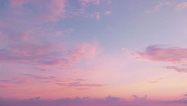 Dreamy Pastel Dawn Sky with Soft Pink and Lavender Hues