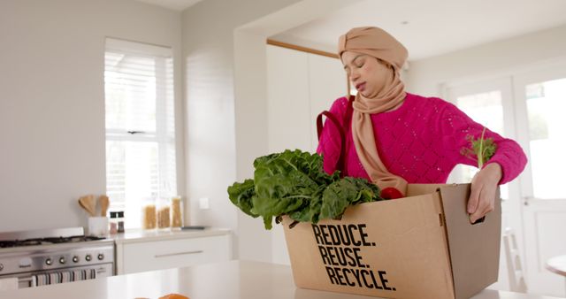 Woman Unpacking Groceries in Sustainable Packaging at Home - Download Free Stock Images Pikwizard.com