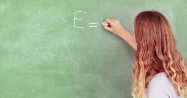 Teacher Writing on Chalkboard in Classroom - Download Free Stock Images Pikwizard.com