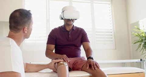 Patient with Prosthetic Leg Using VR in Physiotherapy Session