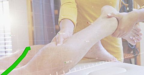 Physiotherapist stretching patient leg with green analytics overlay for modern rehab and mobility