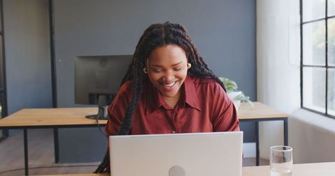Professional Woman Engaging in Online Conference in Modern Workspace - Download Free Stock Images Pikwizard.com