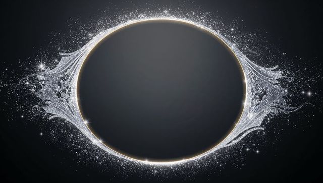 Elegant oval gold frame with silver filigree and sparkling border on dark background