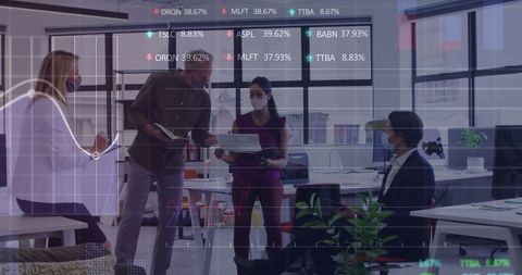 Team analyzing financial data in modern workplace