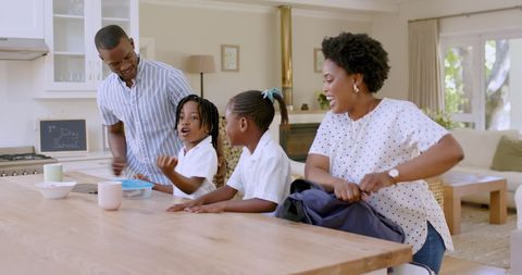 African American Family Bonding in Kitchen, Preparing Lunch